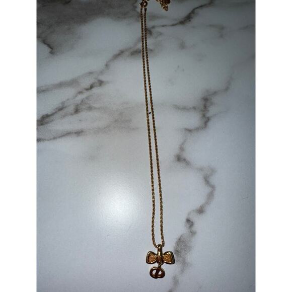 Christian Dior Bow & Logo Necklace in Gold-Tone - Picture 1 of 4